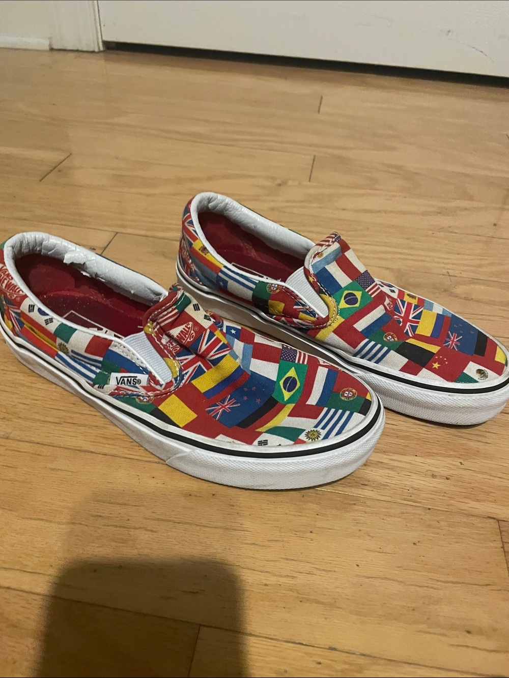 Vans  Slip-On Sneakers with international Flag Print mens 5/ women’s 6.5